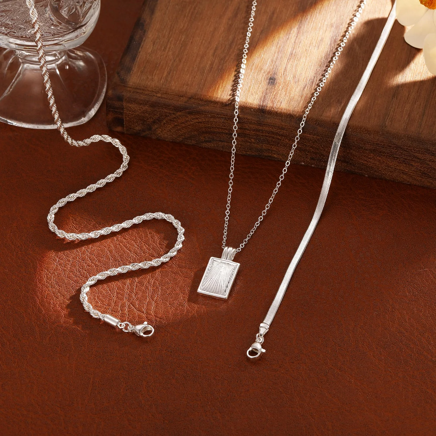 CAROVO Layered Pendant Necklace, Layered twist herringbone tag · Silver